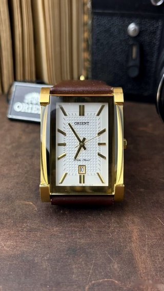 Orient, прямоугольный позолоченный корпус, фактурный циферблат: задняя крышка, фото 2